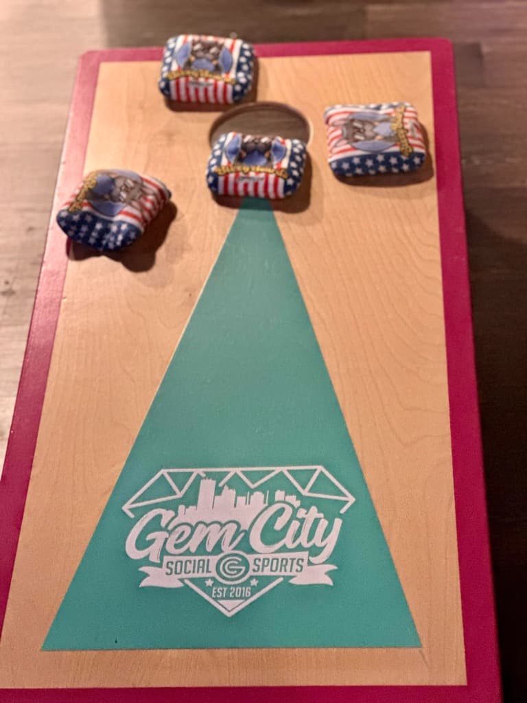 Cornhole bags on board during indoor league play
