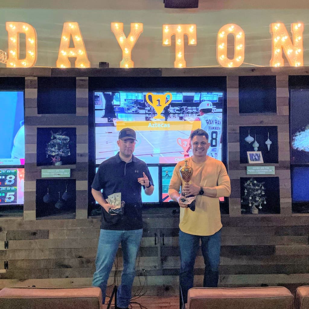 Cornhole League Winner celebrating at Two Social Dayton