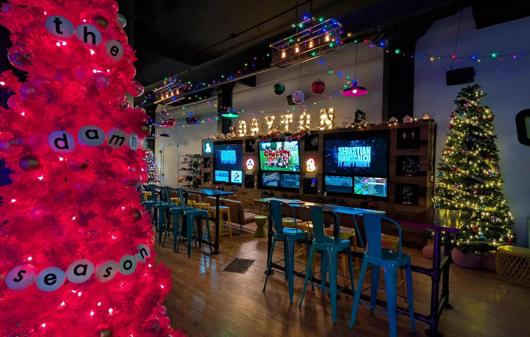 Pink Christmas tree and bar area at Two Social