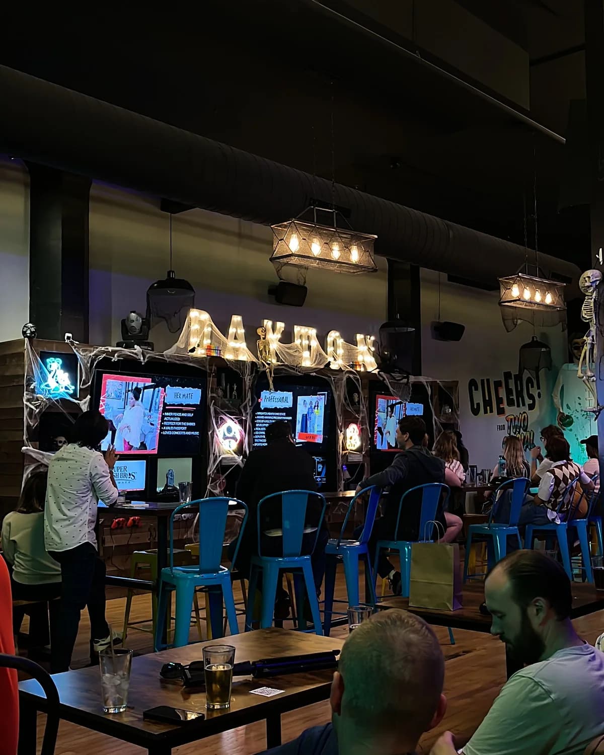Previous Halloween decorations and guests in Two Social’s games area