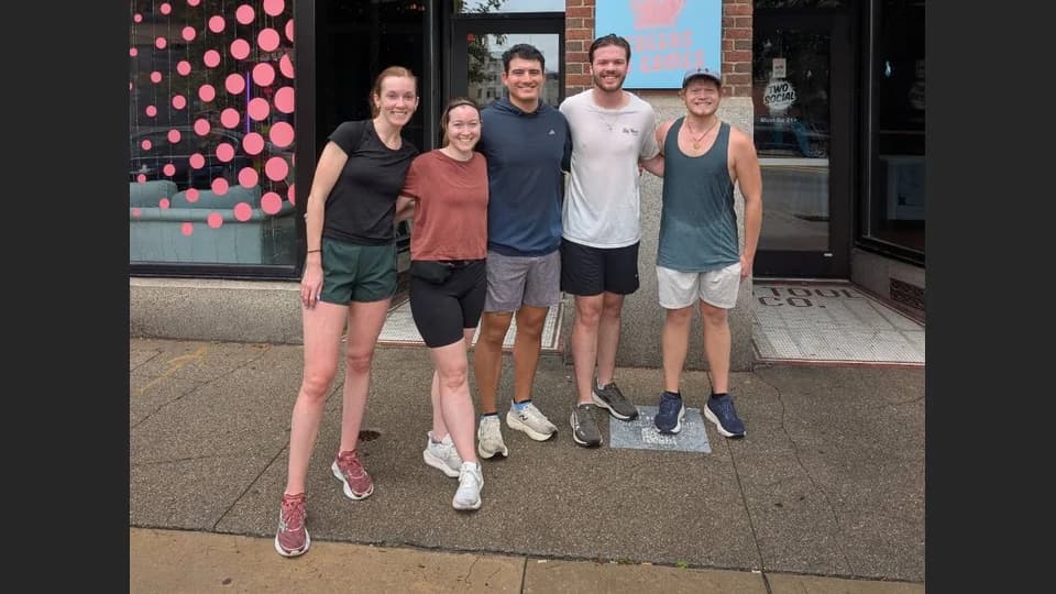 Run937 runners gathered outside Two Social at a previous meetup